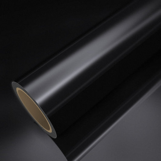Rollo de vinilo cromado negro sobre una lámina del mismo vinilo