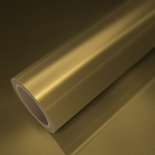 Rollo de vinilo cromado mate oro cepillado sobre una lámina del mismo vinilo