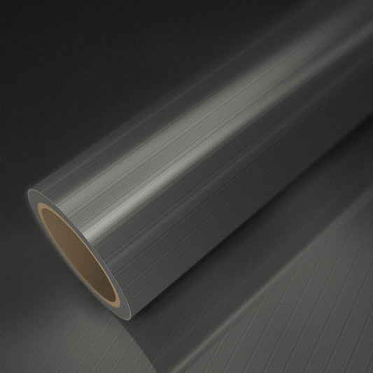 Rollo de vinilo titanio cepillado sobre una lámina del mismo vinilo